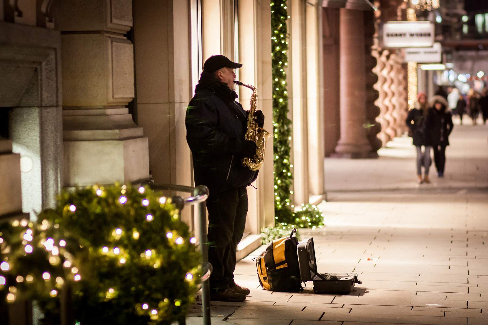 A lone musician playing on the side