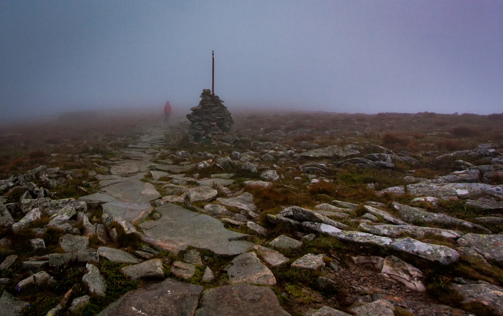 Fog and a rocky path on the ascent to the summit!