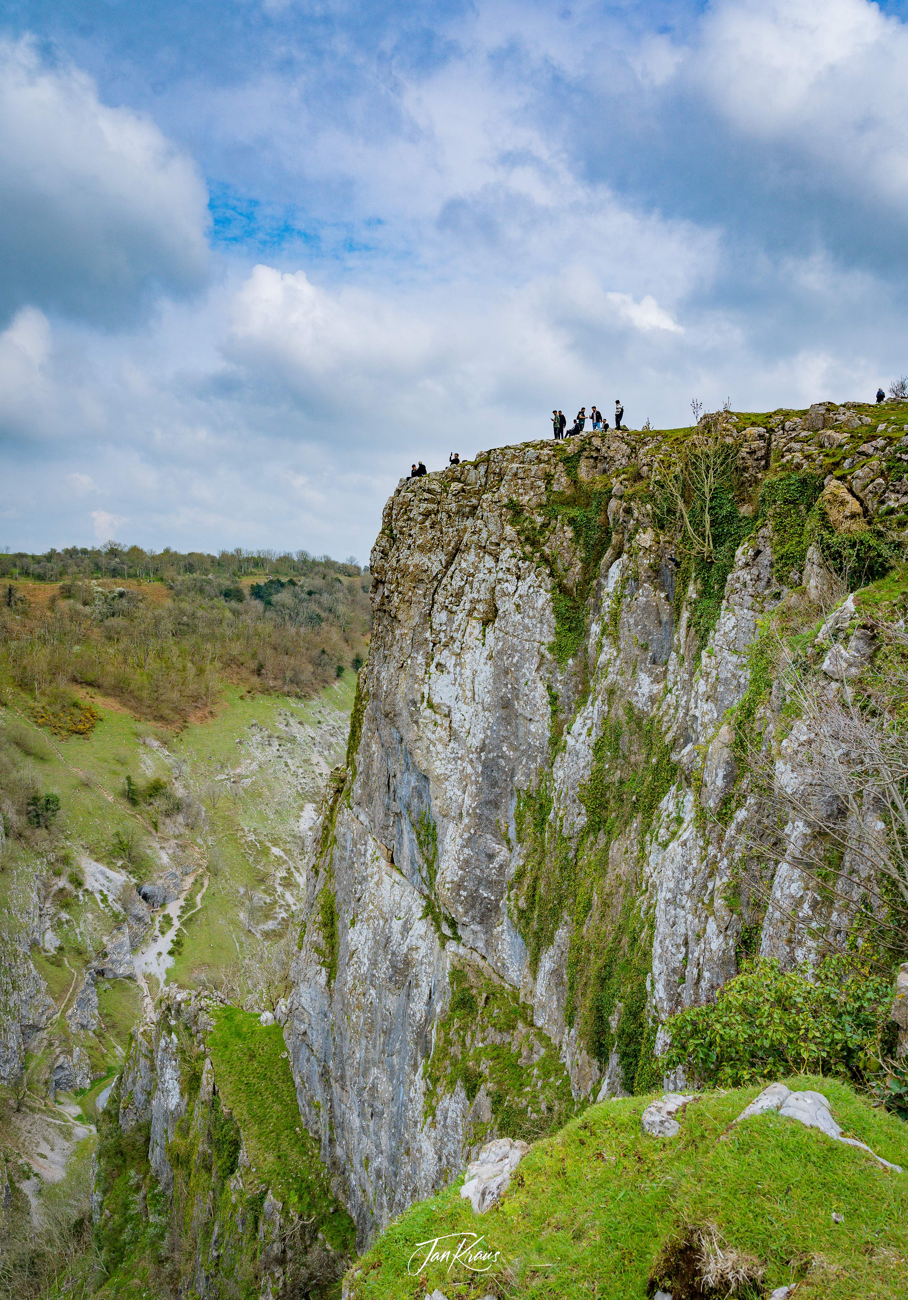 View over the the clifftops of Cheddar Gorge, facing the Cheddar Village, Somerset, England, UK