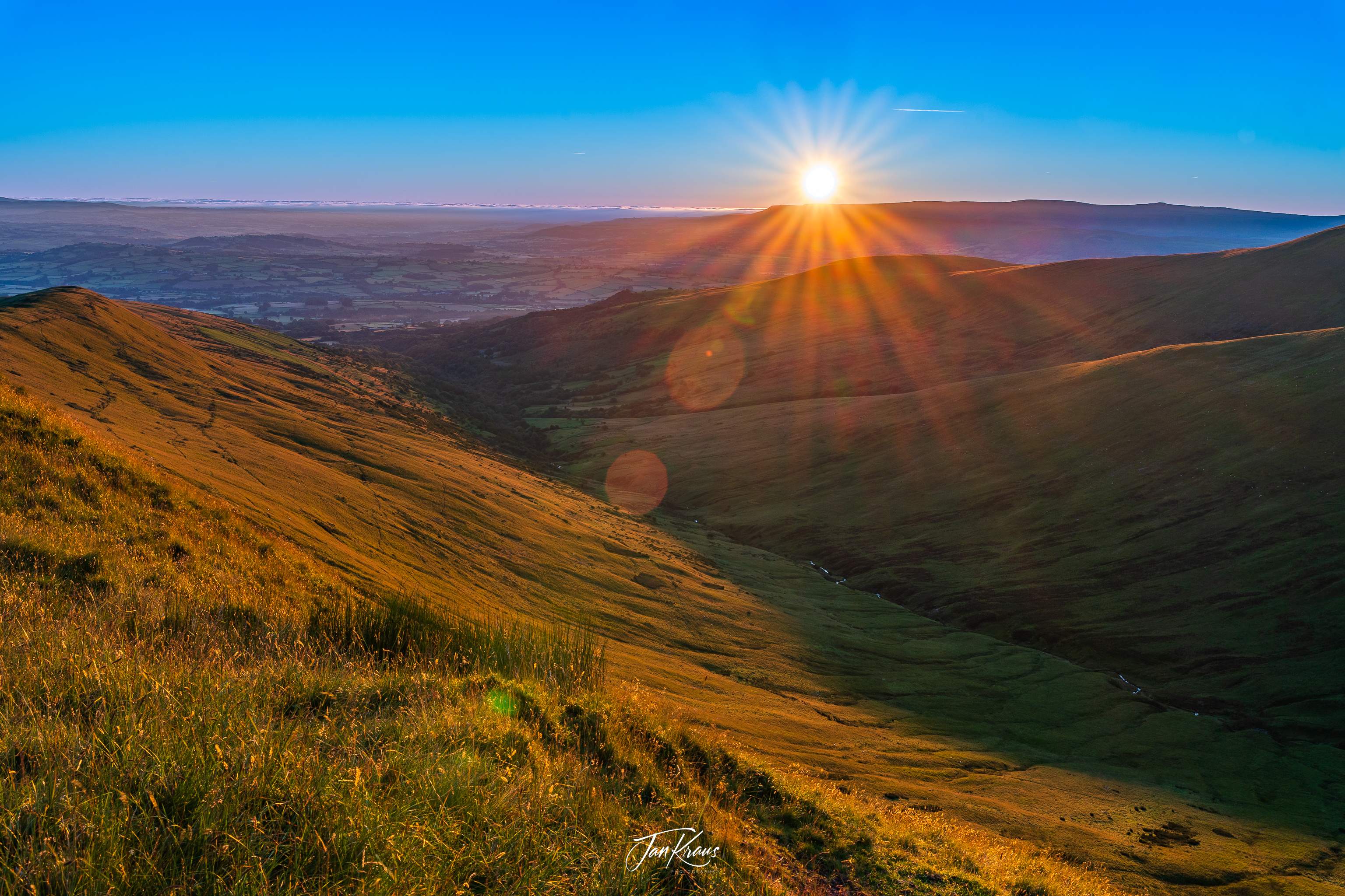 Sunrise seen from Fan Y Big ridge, Brecon Beacons Mountains, Wales, UK