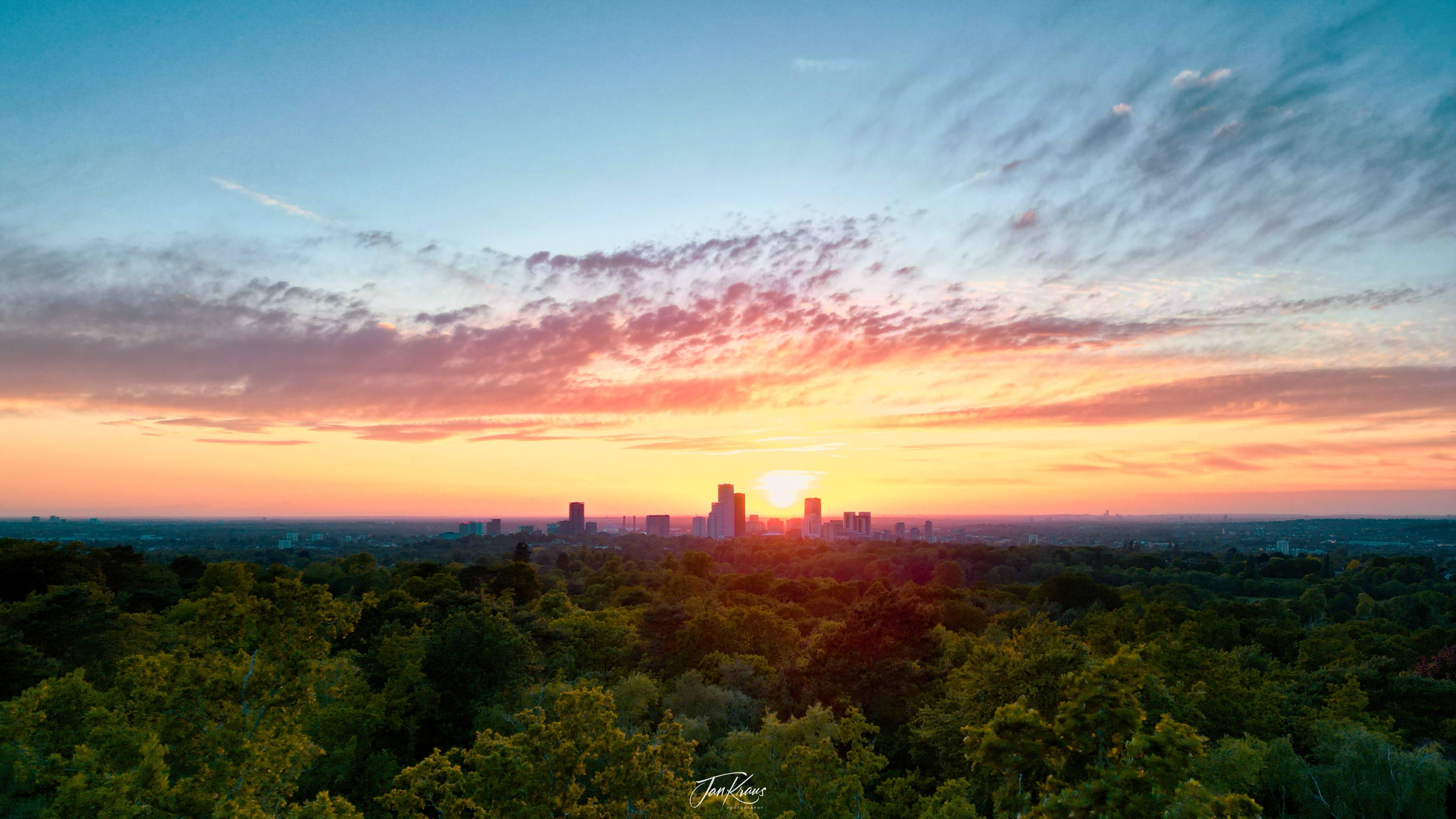 Sunset over Croydon,
UK with dramatic clouds, captured with DJI Mini 3 Pro drone