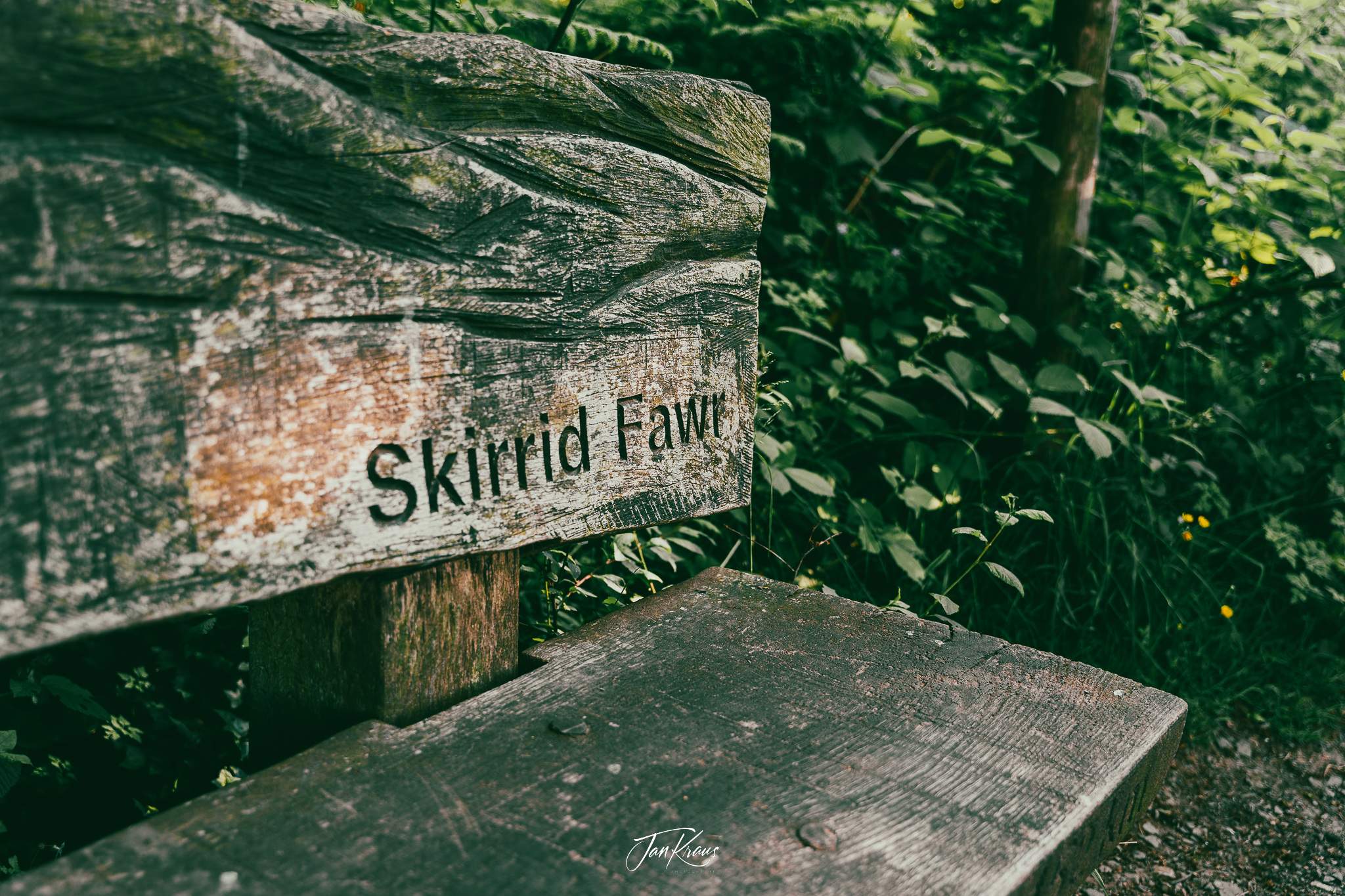 A sign on a bench on the path towards Skirrid Fawr, Wales, UK