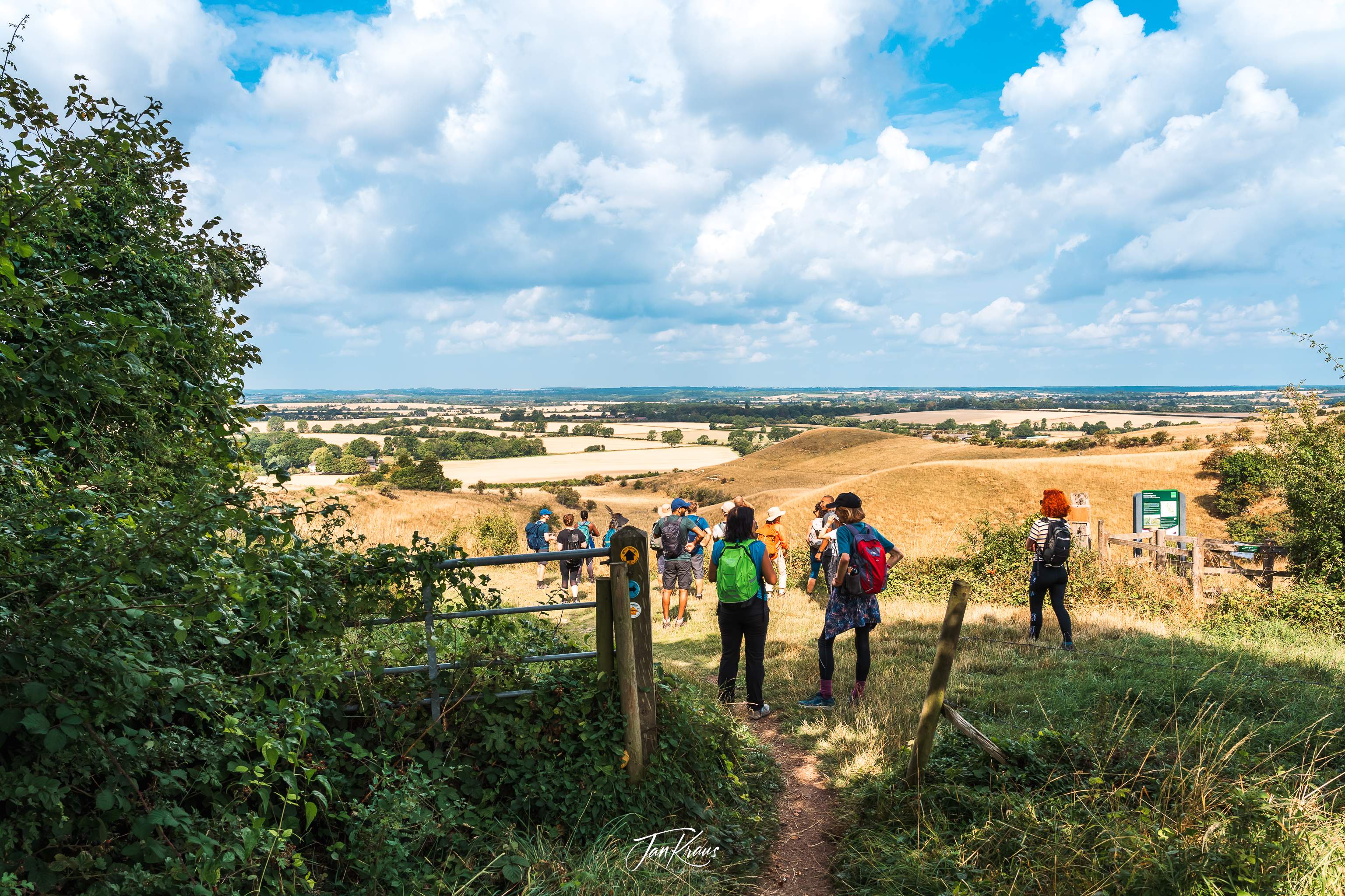Our group stopping to catch a breath and admire views over Knocking Hoe National Nature Reserve (right side of the picture), Hertfordshire, England, UK