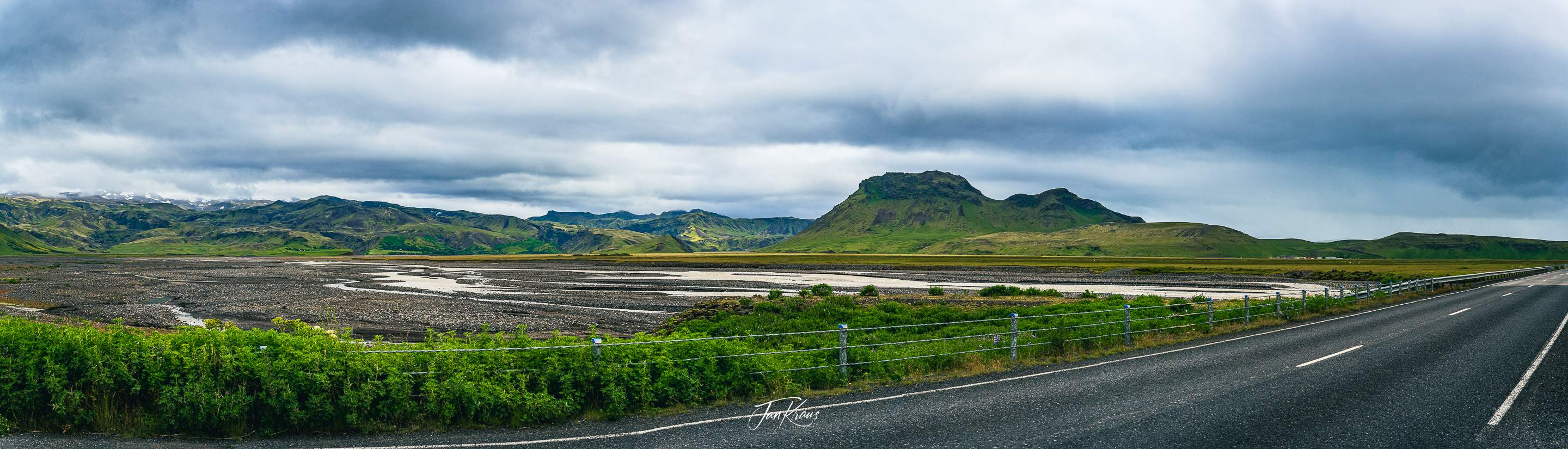 A panoramic view somewhere on the Ring Road towards Vik with some mountains reaching Mýrdalsjökul glacier, Iceland