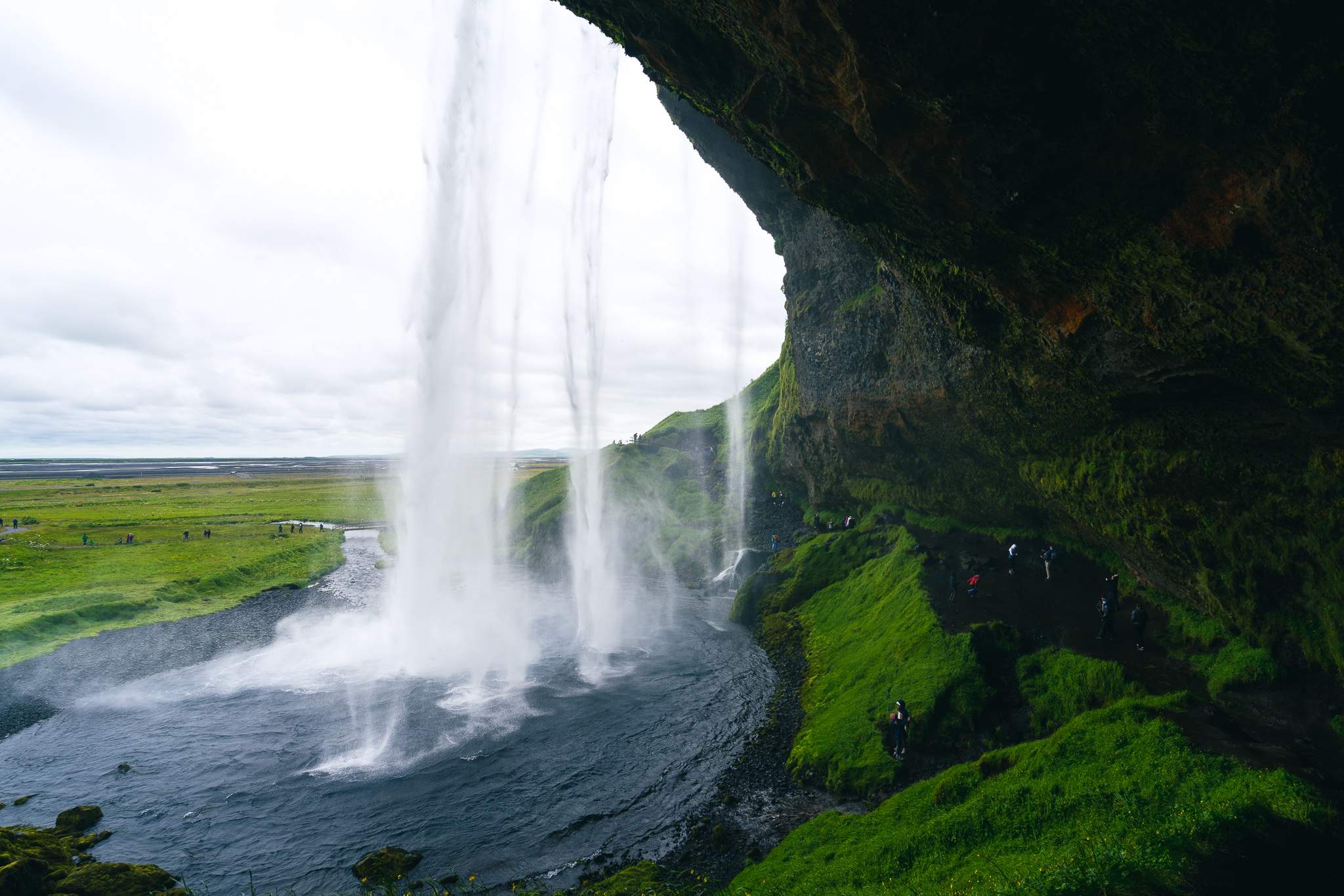 A view from behind Seljalandsfoss waterfall, Iceland