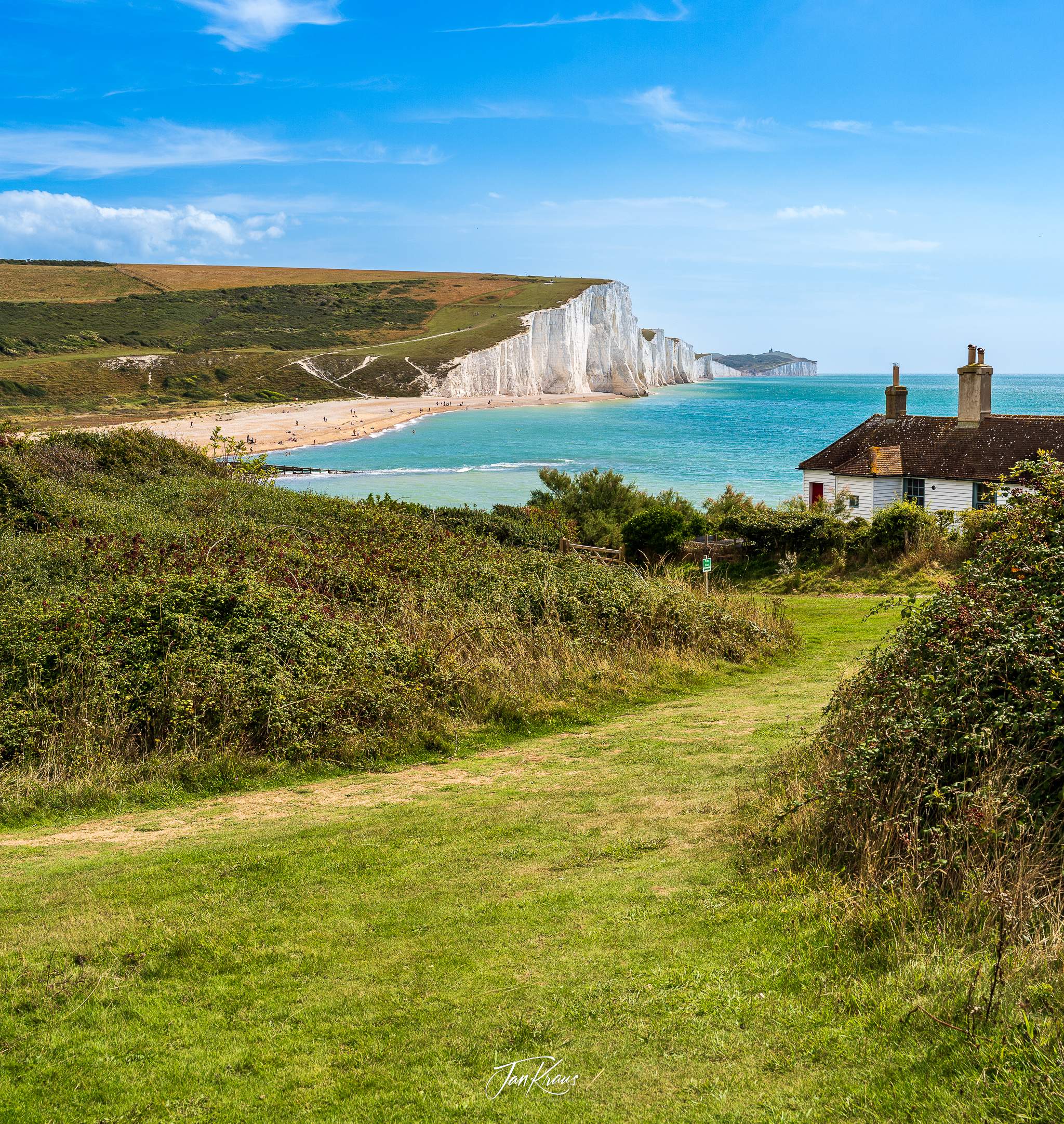 Coastguard Cottages overlooking the Seven Sisters cliffs, East Sussex, England, UK