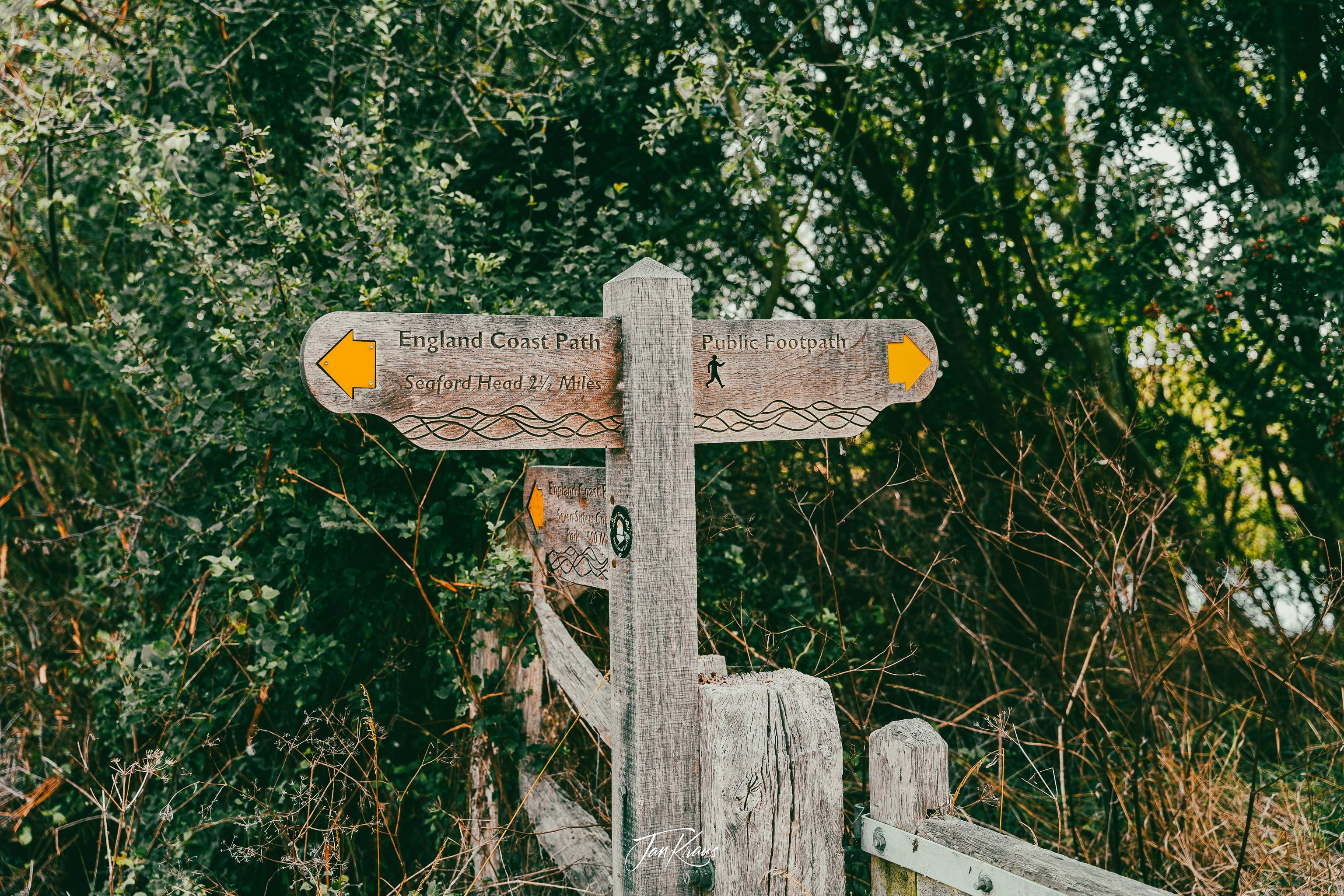 A signpost at Cuckmere Haven path, East Sussex, England, UK