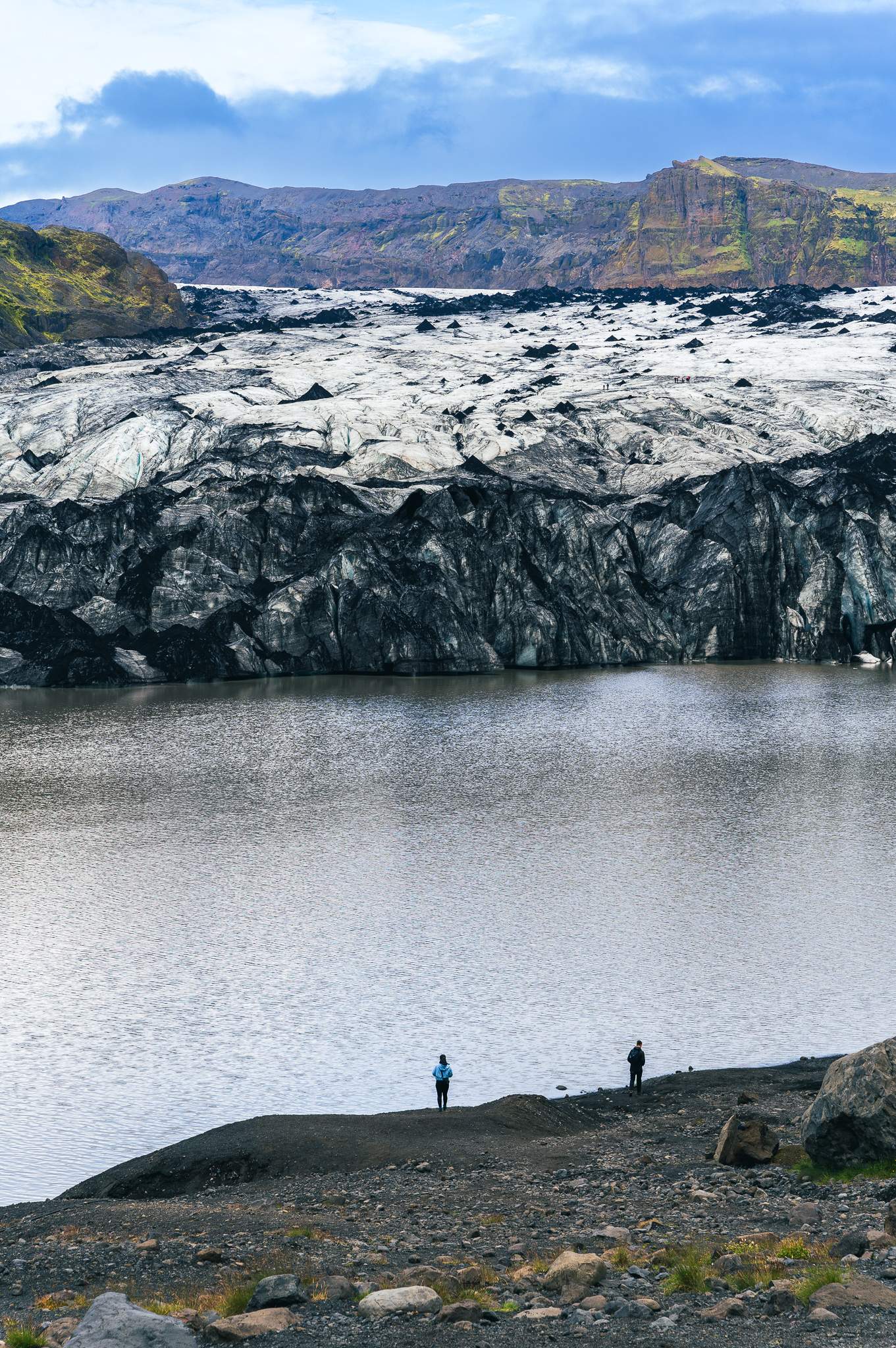 Head of Sólheimajökull glacier - the black stains are caused by ashes accumulated from past volcano eruptions, Icleand
